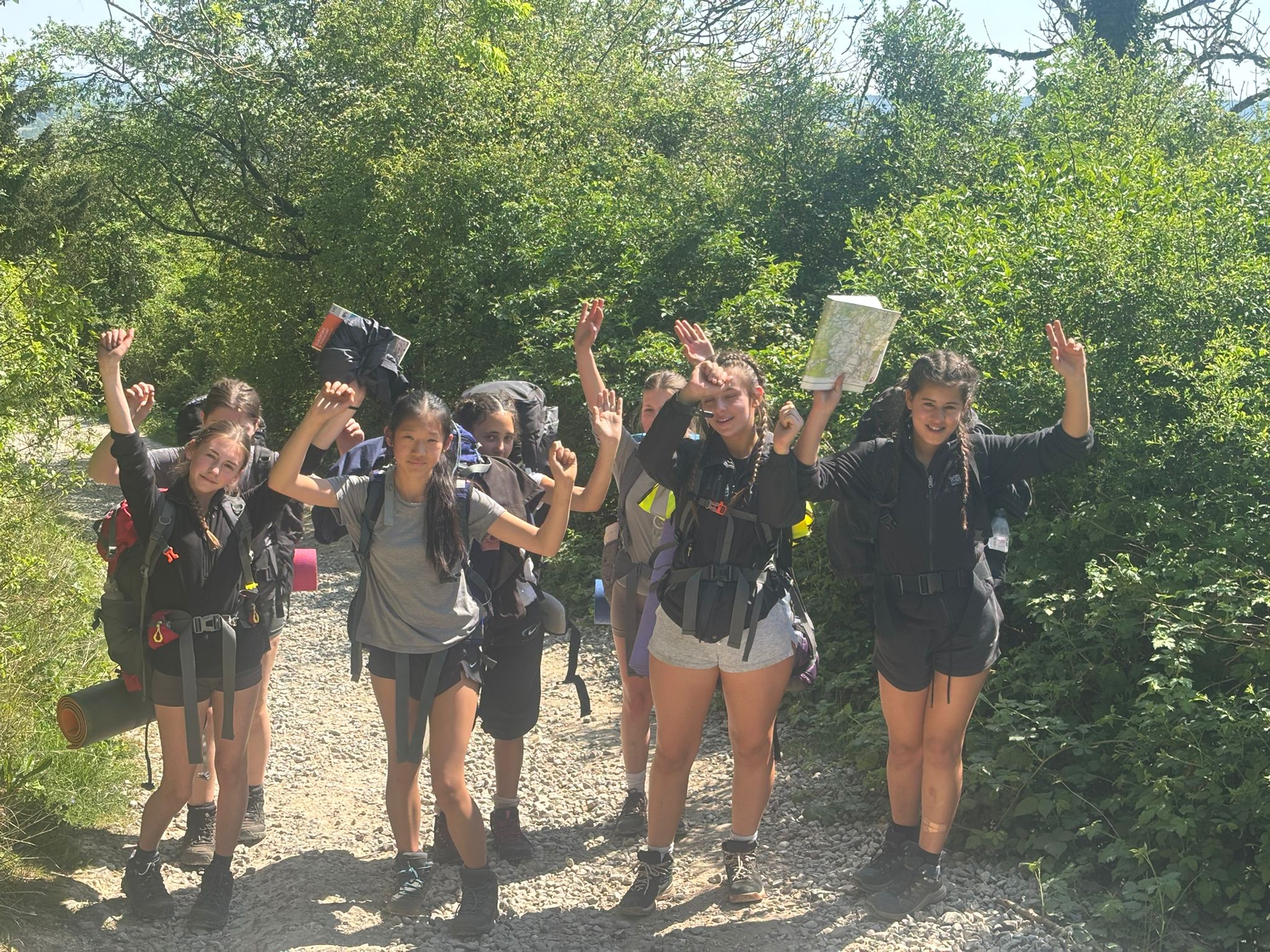 DofE participants walking together on an expedition in the UK countryside